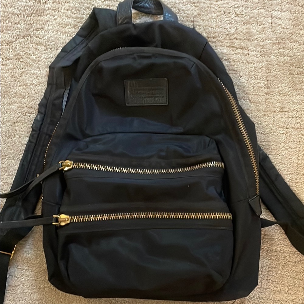 Marc Jacob’s Small Black Backpack with Gold Accents / Bloomingdales